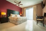 Your master suite with king bed, walk-in closet, en suite bathroom and balcony